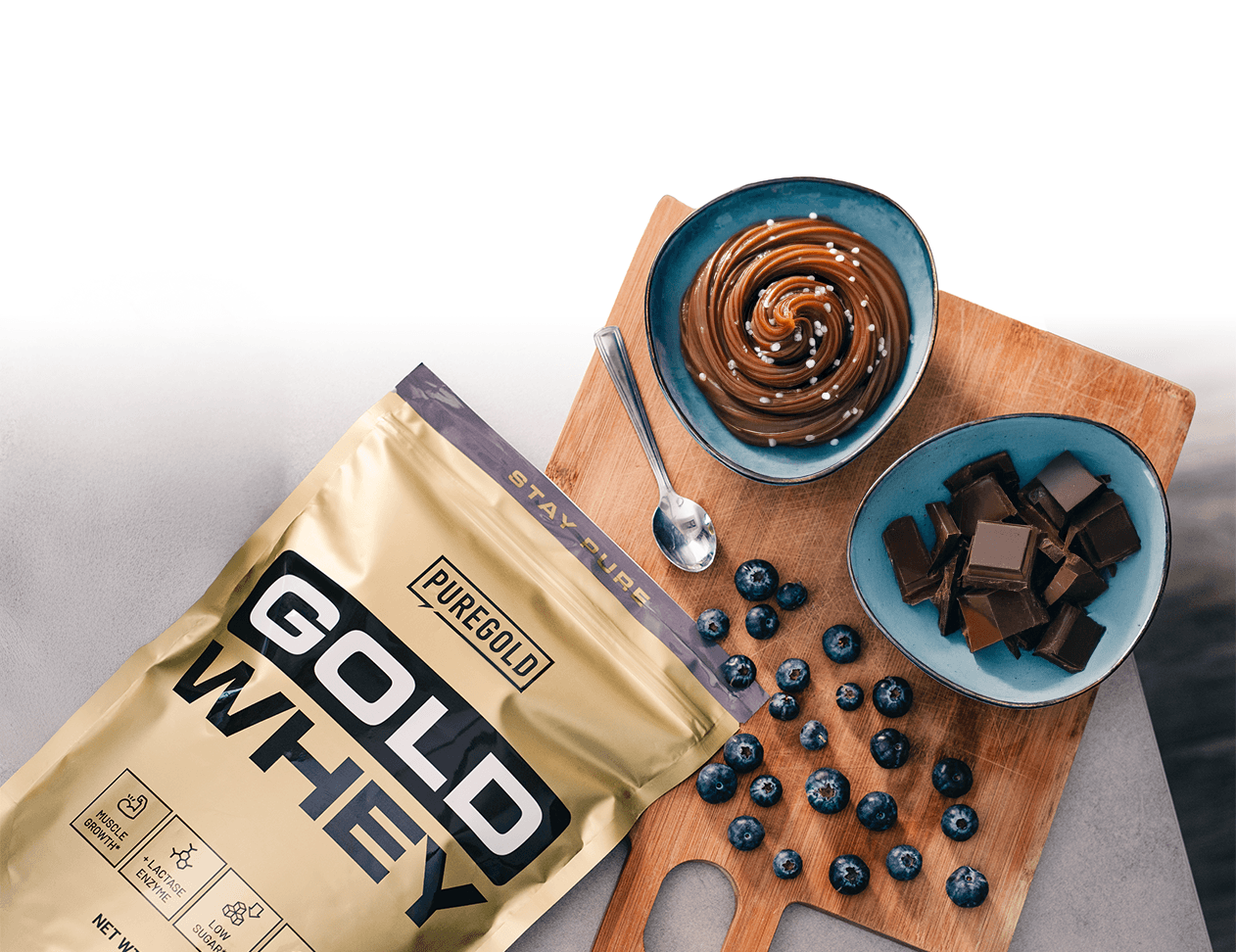 Gold Whey protein powder with blueberries and chocolate